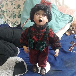 Unsigned Marie Osmond boy doll w stand
